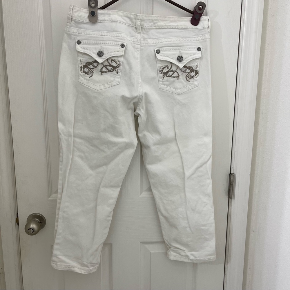 Women’s classic rise white Vintage American Jeans. Size 14/31.